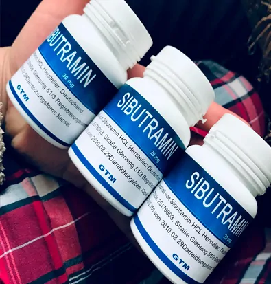 Фото трех флаконов сибутрамина